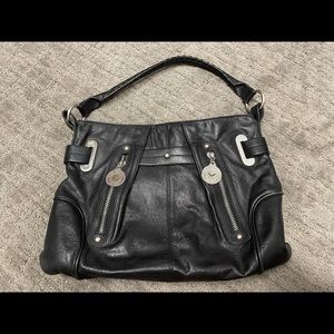 Via spins block purse